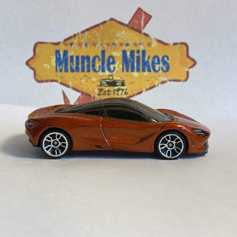 Orange Hot Wheels McLaren 720S in right-side view, with dark glazing and silver-colored wheel faces
